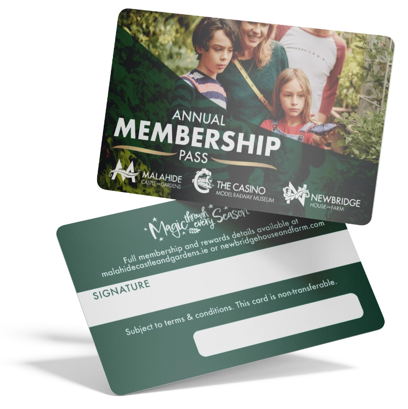 Front and back view of an annual membership pass for Malahide Castle and Gardens, The Casino Model Railway Museum, and Newbridge House & Farm. The card includes a signature space and terms noting it is non-transferable. Whether you visit Malahide Castle or the gardens, this pass offers memorable experiences year-round.